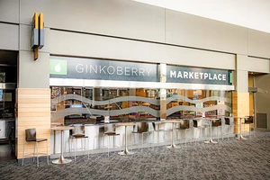 Modern marketplace with "Ginkoberry" sign. 