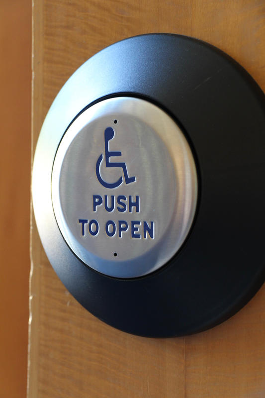 photo of an automatic door opener button