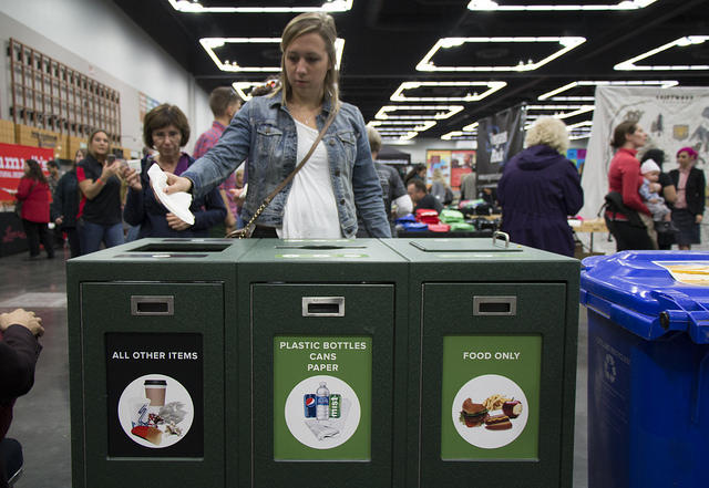 photo of OCC guest using recycling station