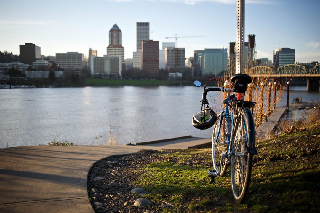 photo of a bike parked near the Willamette River in Portland