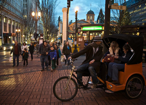 photo of holiday shoppers at night in Portland